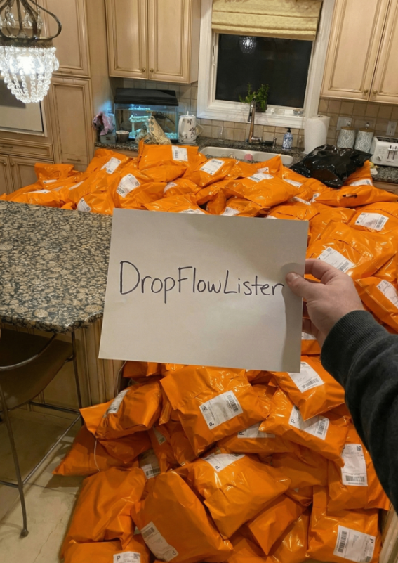 A large stack of orange shipping mailers highlighting successful order fulfillment using the DropFlow Lister platform.
